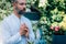 Man meditating Outdoors and keeping hands together in a prayer position