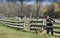 Man mending fence