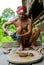 Man Mentawai tribe prepares poison for the arrows for hunting.