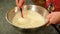 Man Mixes the Ingredients in a Metal Bowl For Making Cookies. Hand Baker Prepares the Dough With Eggs, Butter, Sugar and