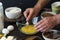 Man mixes ingredients for preparation chocolate cake or pie