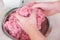 man mixes minced meat in bowl his hands. Preparation minced beef, pork for cutlets, meatballs, chops