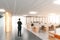 Man in modern open space office with furniture