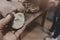 Man molding clay to make ceramics with his hands, Artisan working in his workshop, Selective Focus