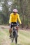 man and mountain bike riding in jungle track use for bicycle sport outdoor and extreme activities