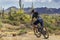 Man Mountain Biking Fast On A Arizona Desert Trail