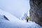 Man mountaineer alpine in winter alpinism hiking mountain