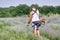 Man mowing among lavender rows