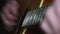 Man musician playing classic, acoustic guitar. Concept. Close up of male hands playing guitar, performing and taking