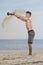 Man with a naked body doing kettlebell exercise