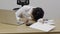 Man with narcolepsy is fall asleep on office desk.Narcolepsy is a sleep disorder that makes people very drowsy during the day.