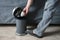 Man opening and discarded wrinkled paper in bin