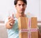 Man opening fragile parcel ordered from internet