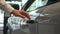 A man opens a car door with a fingerprint. Integrated handle.