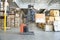 Man Operating Forklift Truck In Warehouse