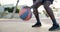 Man, outside and hands with basketball in court, Fitness and health for cardio sport in neighbourhood. Dribble, practice