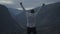 Man With Outstretched Hands At The Top Of A Mountain