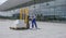 Man in overall operates a forklift loaded with boxes