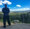 Man overlooking caldera at Yellowstone National Park