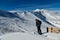 Man overlooking on Emperial bowl ridge at Breckenridge Ski resort. Extreme winter sports.