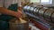 Man packing cheese ready for processing