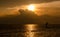 Man on paddle board and Michigan sunset