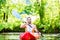 Man paddling with kayak on river