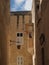 Man painting balcony roof in Malta