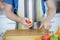 Man pealing apple with knife