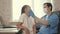 Man pediatrician examines the girl in the office. pediatrician doctor examines the child. professional doctor and