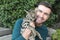 Man with pedigreed Savannah cat