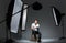 Man photograph sitting on the chair in professinal studio