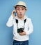 Man photographer with a camera talking on the phone, tourist, different emotions