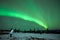 Man photographing the Aurora Borealis