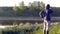 A man photographs the morning fog. Warm summer landscape.