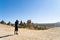 A man photographs the unusual mountain landscape of Cappadocia