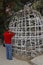 Man places wish at sacred \'wish stones\' at Namsangol traditional folk village, Seoul, South Korea - NOVEMBER 2013