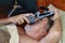 Man Placing CPAP Headgear