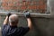 Man plastering wall. Worker makes renovation. Construction work