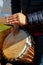 A man playing African Drum Djembe