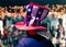 Man Playing American Flag Tall Hat Cap on Man on Stage with bokeh balls