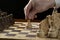 A man is playing chess.Close-up.Chess board and pieces