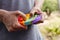 Man playing with a colorful destressing toy