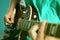 Man playing on electric guitar, a pleasant, relaxing day, music and sound, Closeup