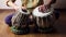 Man playing on Indian tabla drums