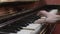 Man playing melody on piano by one hand. Musician. Talent. Song. Black and white keys.