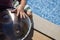 Man playing a musical instrument called a handpan. oriental music