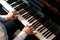 Man playing piano, above view. Talented musician