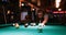 Man playing snooker in night club 4k
