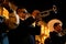 A man playing a trumpet during yearly anniversary celebration